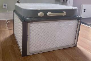 Air purifier for online wood smoke